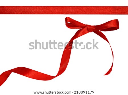 Red bow isolated on white background Royalty-Free Stock Photo #218891179