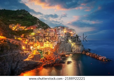 Fantastic morning view of Manarola city with costal rocks on a foreground. Cinque Terre National Park, Liguria, Italy, Europe. Landscape photography