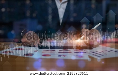 Businessman using the tablet. Data analytics report and key performance indicators on information dashboard for Business strategy, Stock market indicator and financial investment