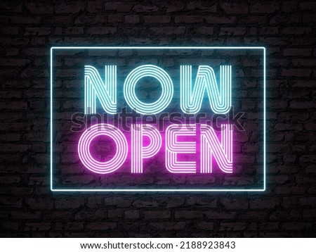 A retro pink and blue colored now open neon sign in front of a brick background. Signage for a bar, club or restaurant. Nightlife concept. Royalty-Free Stock Photo #2188923843