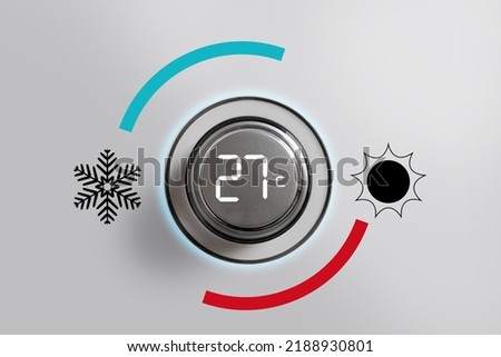 Air conditioning button at 27 degrees of temperature. Saving energy. Restriction and limitation of electricity use caused by gas shortage. Energy dependence Royalty-Free Stock Photo #2188930801