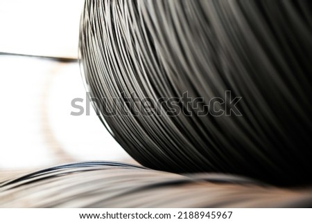 iron or steel wire stacked in the metal industry. wire drawing annealing Royalty-Free Stock Photo #2188945967