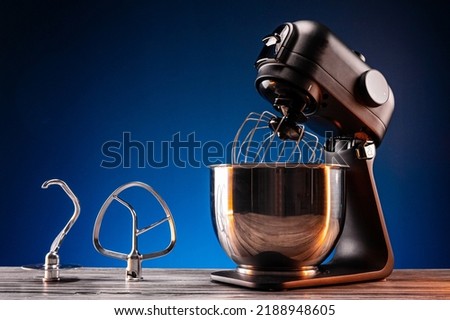Planetary mixer, whisk and bowl, kitchen helper Royalty-Free Stock Photo #2188948605