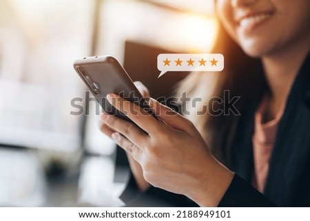 Product or service review ideas from customers, writing reviews from customers who use the products and services of the store to express their satisfaction and increase the credibility of the store. Royalty-Free Stock Photo #2188949101