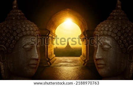 Buddha faces in the temple of Bagan Royalty-Free Stock Photo #2188970763