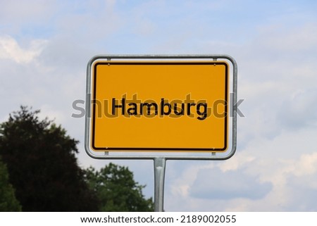 General city entry sign of Hamburg, Germany, orange traffic sign
