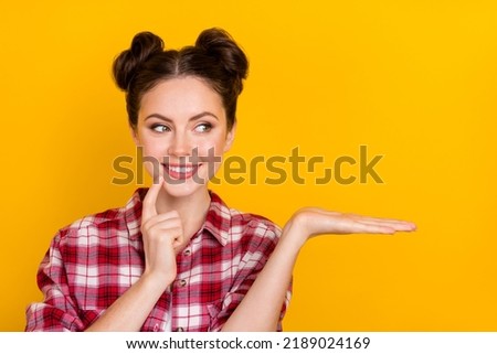 Photo of girlish lady promoter hold hand empty space decide select promotion ad isolated on vivid color background