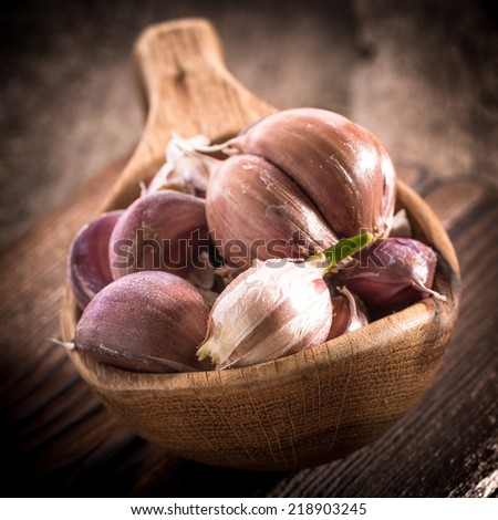 garlic bulb on rustic wooden background