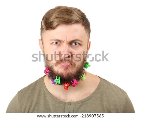 Portrait of handsome man with beard of barrettes isolated on white