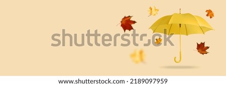 Yellow umbrella with leaves on an orange background. tinting