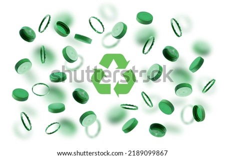 Green bottle caps, recycling symbol on a white background. Plastic caps float, fly in the air. The concept of safety from environmental damage. The idea of environmental sustainability, Earth Day.