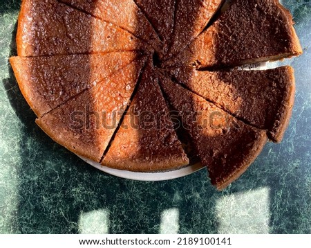 Homemade sliced ​​sunburst pie on the table
