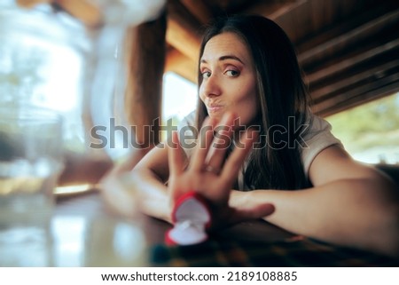 
Unhappy Girlfriend Pushing Away Engagement Ring Refusing Proposal. Uninterested woman rejecting a gift from her ex-partner
 Royalty-Free Stock Photo #2189108885