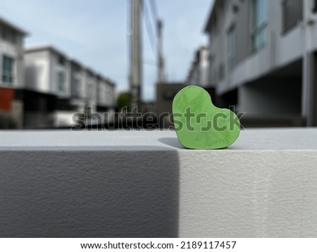 The green heart on the wall Royalty-Free Stock Photo #2189117457