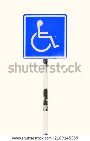 Blue handicapped sign parking spot. Disabled parking permit sign on pole isolated on white background. Object with clipping path Royalty-Free Stock Photo #2189145359