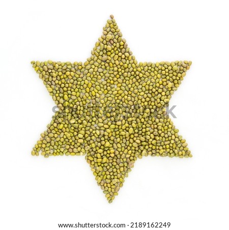 David star made from mung beans. Green mung bean sign. Symbol made from green gram . White background. Dry green maash seeds.