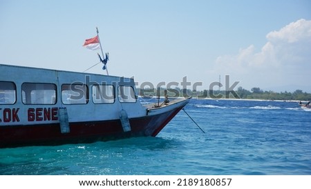 Ships with a flag - ships at anchor
