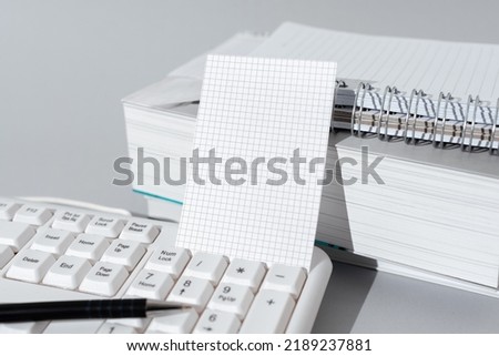 Important Message Presented On Piece Of Paper On Desk With Keyboard, Books, Notebook And Pen. Crutial Information Written On Note. New Ideas Displayed On Memo.