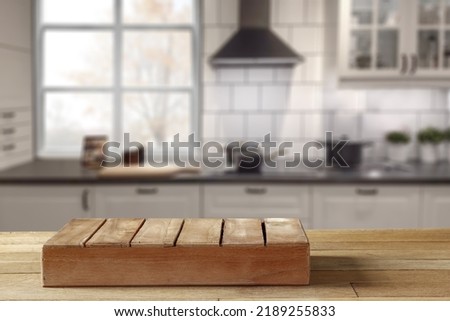 Wooden table of free space and kitchen interior. Free space for your decoration. 