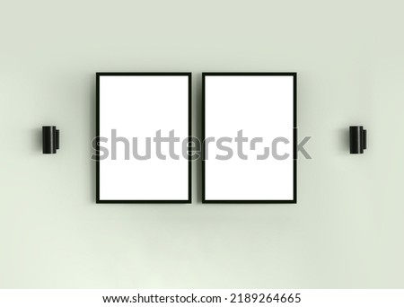 Two frames with blank white isolated posters on the mint green wall. Minimalistic cozy interior mockup. Picture template for branding, text, logo, design. Modern style room with copyspace