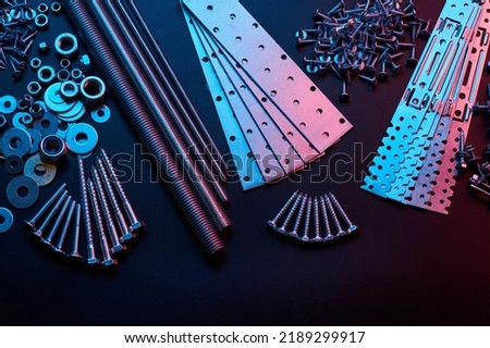 Set of bolts nuts nails metal fasteners. Consumable hardware tools. assortment steel screws collection close up background Royalty-Free Stock Photo #2189299917