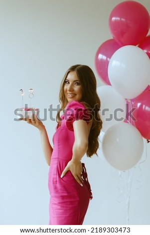 Birthday girl is wearing pink dress