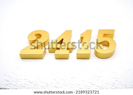   Number 2415 is made of gold painted teak, 1 cm thick, laid on a white painted aerated brick floor, visualized in 3D.                                     