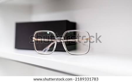 Stylish elegance eyeglasses. Optical correction eyesight device. Royalty-Free Stock Photo #2189331783