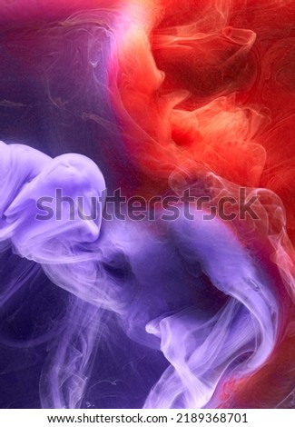 Blue red colorful smoke abstract background, acrylic paint underwater explosion