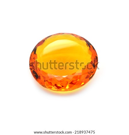 Golden citrine on a white background. Macro shooting. Royalty-Free Stock Photo #218937475