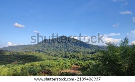 Hill view with blue sky background