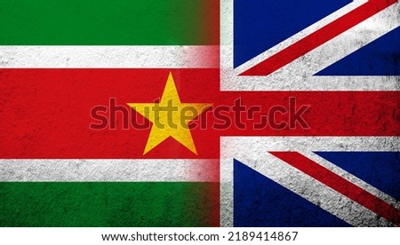 National flag of United Kingdom (Great Britain) Union Jack with The Republic of Suriname National flag. Grunge background