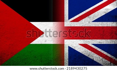 National flag of United Kingdom (Great Britain) Union Jack with Flag of Palestine. Grunge background