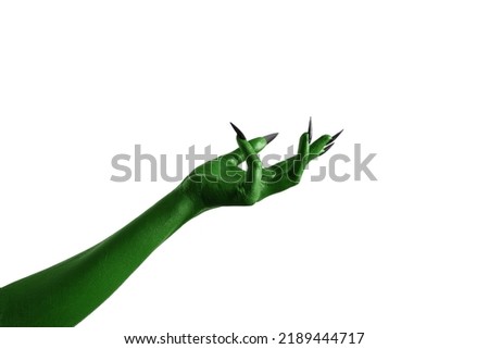 Halloween green color of witches, evil or zombie monster hand isolated on white background. Royalty-Free Stock Photo #2189444717