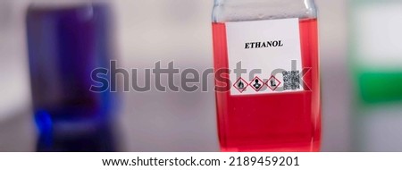 Biofuel in chemical lab in glass bottle Ethanol Royalty-Free Stock Photo #2189459201
