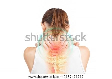 Spine of woman with neck pain. Young woman holding his neck in pain. Medical concept. Healthcare and medical concept: pain in a neck. Royalty-Free Stock Photo #2189471717