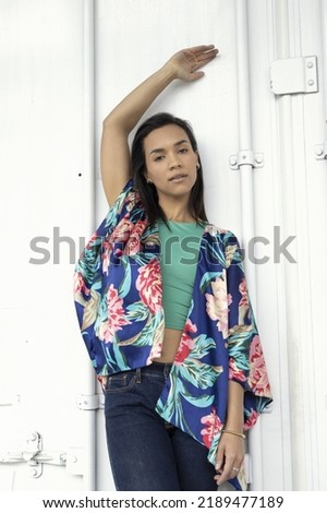 resting young model lifestyle, latin woman with short black hair, wear casual clothes