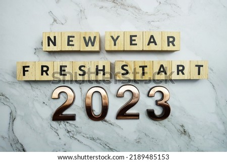 New Year Fresh Start 2023 text on marble background Royalty-Free Stock Photo #2189485153