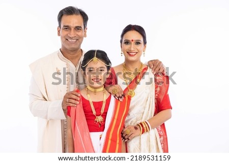 Portrait of happy bengali family in traditional clothing on occasion of durga puja celebration
 Royalty-Free Stock Photo #2189531159