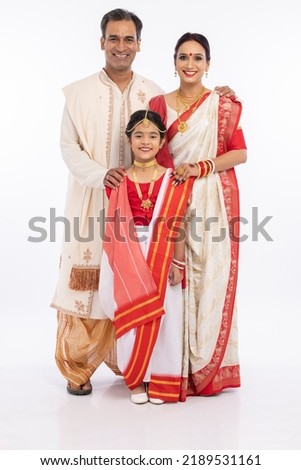 Portrait of happy bengali family in traditional clothing on occasion of durga puja celebration
 Royalty-Free Stock Photo #2189531161