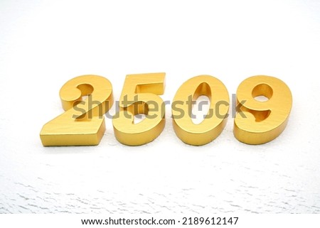   Number 2509 is made of gold painted teak, 1 cm thick, laid on a white painted aerated brick floor, visualized in 3D.                               