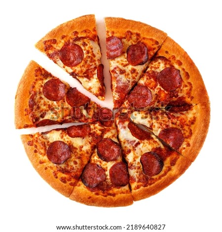Classic pepperoni pizza with cut slices isolated on a white background
