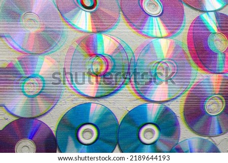 Image of cd's with glitch effect, retro wallpaper, futuristic, color effect. Royalty-Free Stock Photo #2189644193