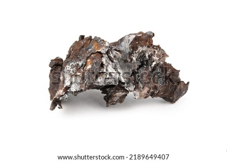 A piece of a meteorite that fell to Earth with melted edges and traces of rust.