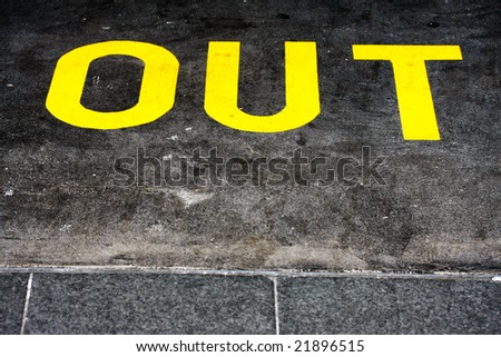 the word 'OUT' written in yellow
