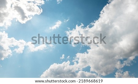 DAY SKY BACKGROUND WITH BLUE AND WHITE CLOUDS. High quality photo