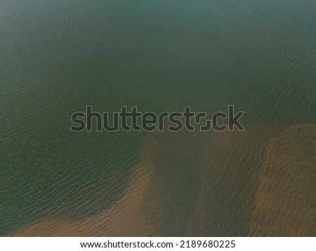 drone shot aerial view top angle seascape turquoise blue water sea ocean beach coastal waves natural scenery wallpaper background india tamilnadu 