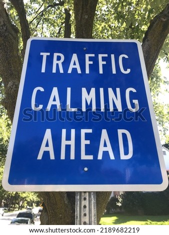Traffic Calming Ahead sign blue