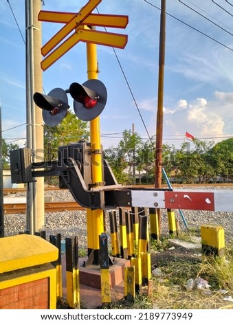 traffic signs on train tracks