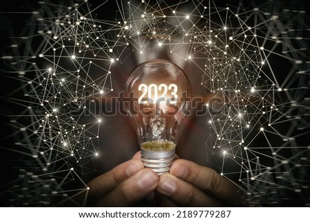 The concept of a new idea in business in the new year 2023.